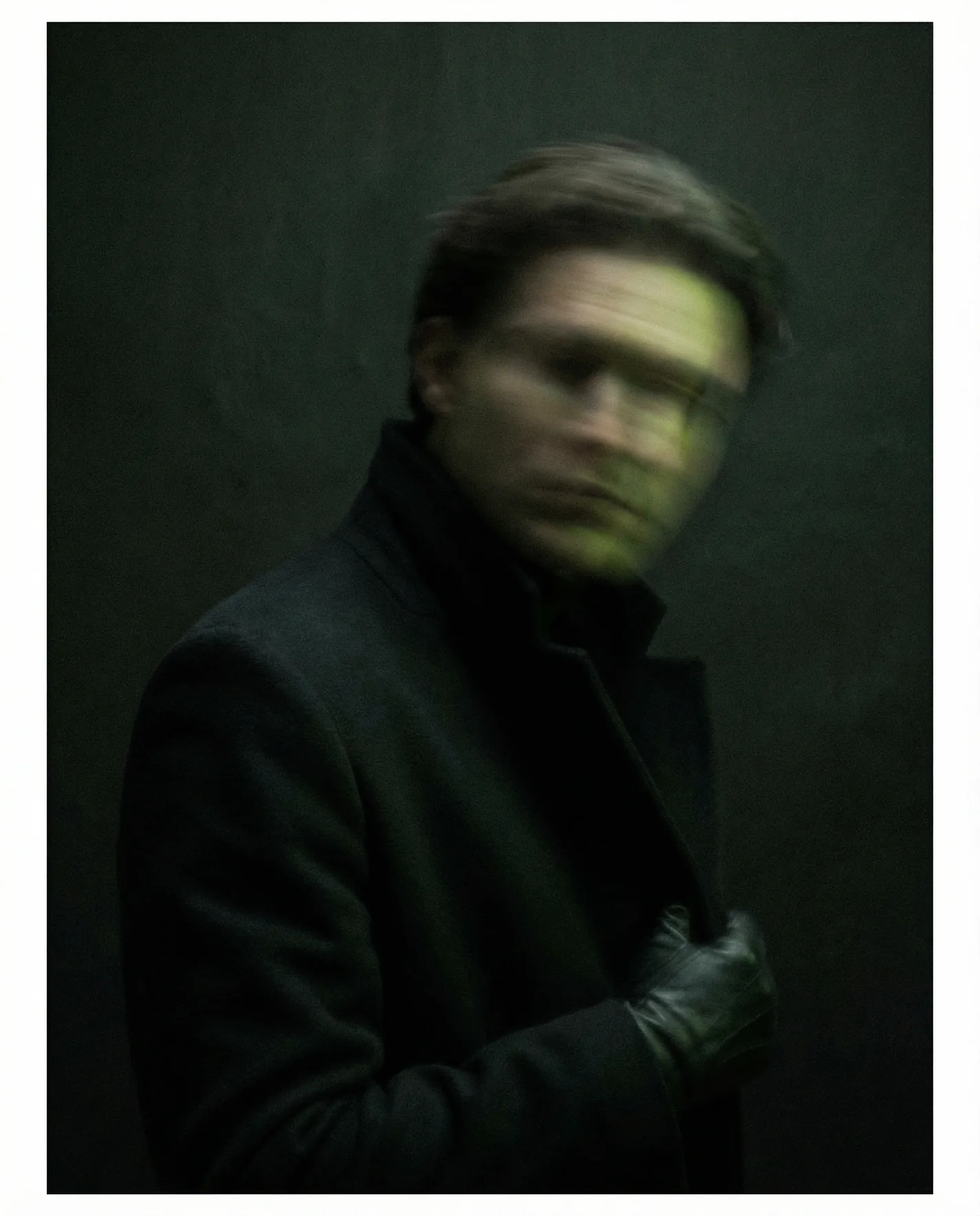 Portrait with the face hidden behind a lime brush stroke